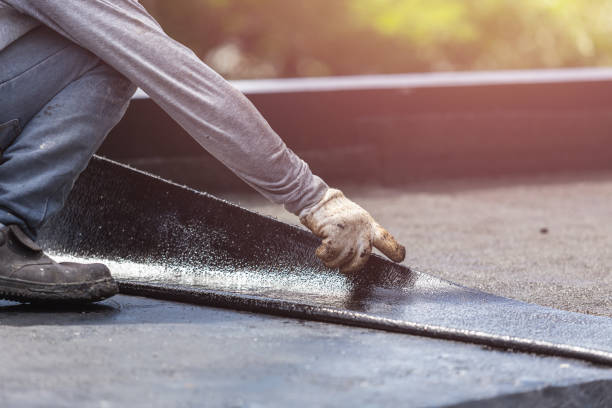 Professional Waterproofing technician working in Bellevue, WA